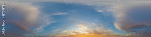 Panorama of a dark blue sunset sky with golden Cumulus clouds. Seamless hdr 360 panorama in spherical equiangular format. Full zenith for 3D visualization, sky replacement for aerial drone panoramas. © panophotograph