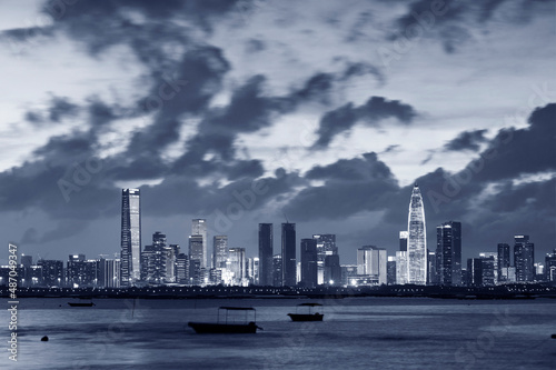 Skyline of Shenzhen city  China under sunset. Viewed from Hong Kong border Lau Fau Shan