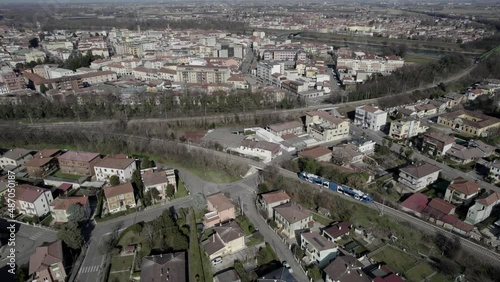 Aerial drone image of a small town in northern Italy. Houses, streets and cars. Early spring. photo