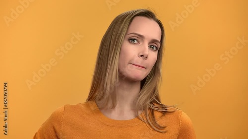 Closeup portrait blonde woman annoyed face expression shaking forefinger no not dont want gesture