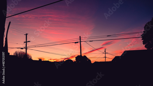 Sunset Over a Silhoutted Town