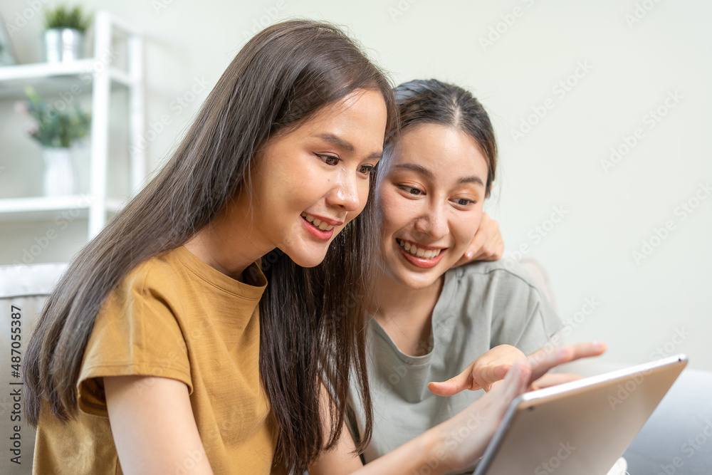 LGBT. Lesbian couple happy Moments at home. Good looking lesbians with bright smiles. LGBT. Lesbian couple happy Moments at home. Good looking lesbians with bright smiles.