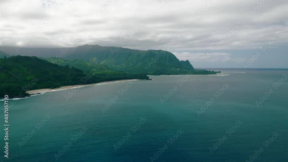 panoramic aerial over seascape and mountains as backdrop in Kauai island, Hawaii, USA panoramic aerial over seascape and mountains as backdrop in Kauai island, Hawaii, USA