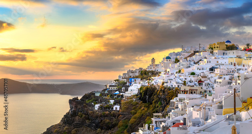 Fantastic sunset on famous view over greek resort Fira, Greece, Europe. luxury travel. famous travel landscape. Summer holidays. Travel concept background.