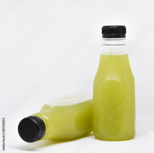 freshly squeezed sugarcane juice isolated on a white background.