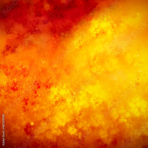 expressive abstract texture with bright color transitions. Bright red, gold background with shiny tints 