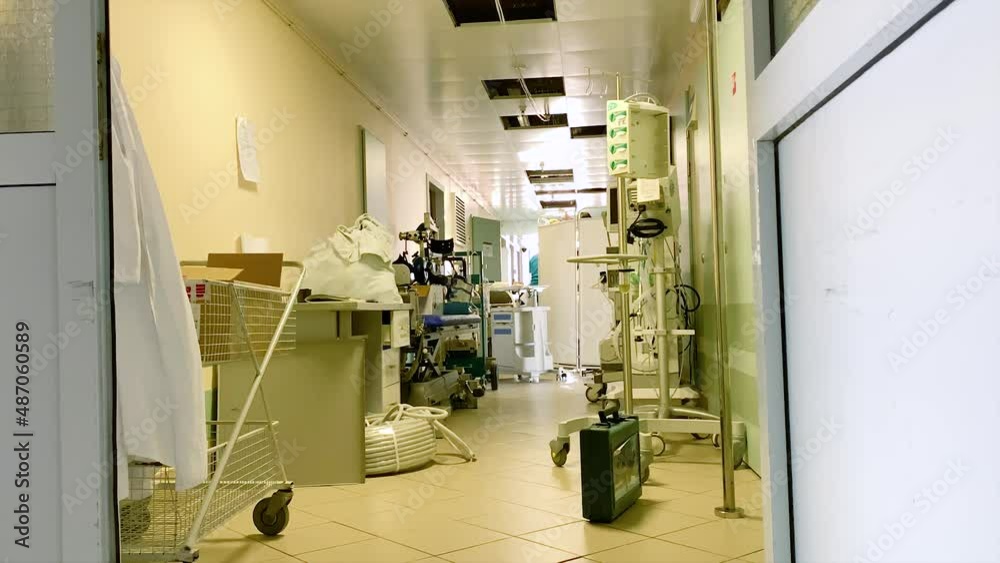 Doctors working in the Hallway of intensive care In A modern Hospital clinic Doctors working in the Hallway of intensive care In A modern Hospital clinic