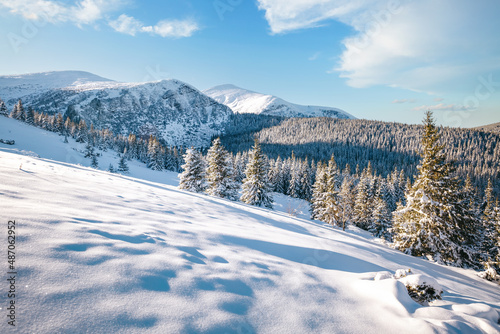 Fabulous view of snow-capped mountains on frosty day.