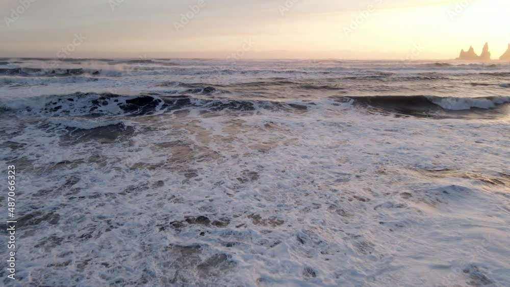 Drone Over Surf On Beach With Reynisdrangar Sea Stacks Drone Over Surf On Beach With Reynisdrangar Sea Stacks