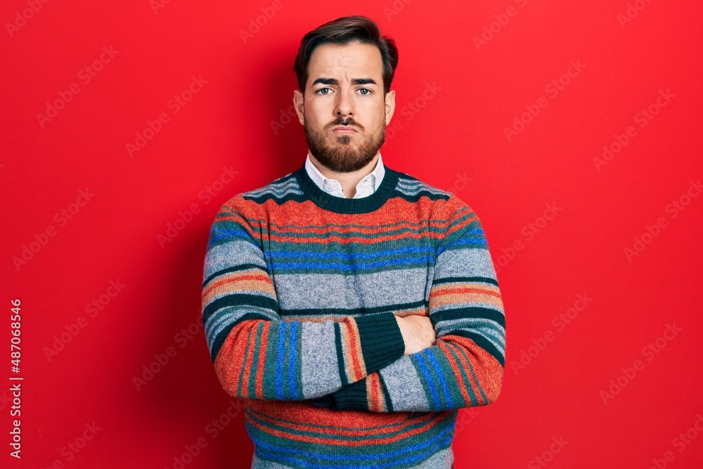 Handsome caucasian man with beard with arms crossed gesture depressed and worry for distress, crying angry and afraid. sad expression. Handsome caucasian man with beard with arms crossed gesture depressed and worry for distress, crying angry and afraid. sad expression.