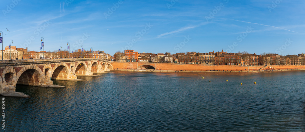 Pont Neuf and boulevard du Maréchal Juin along the Garonne river in winter, in Toulouse in Occitanie, France
