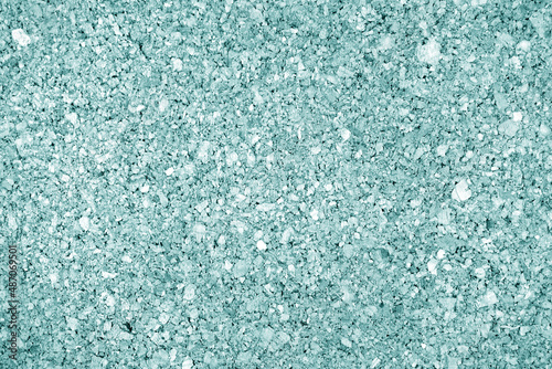 Cork board texture in cyan tone.