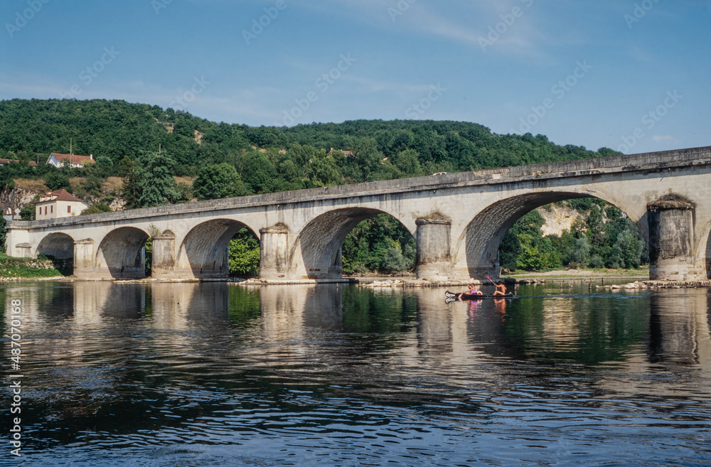 Roman bridge at Dordogne river. Dordogne. France.