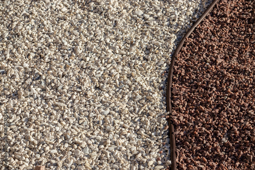 small bright pebbles and gravel as background or texture