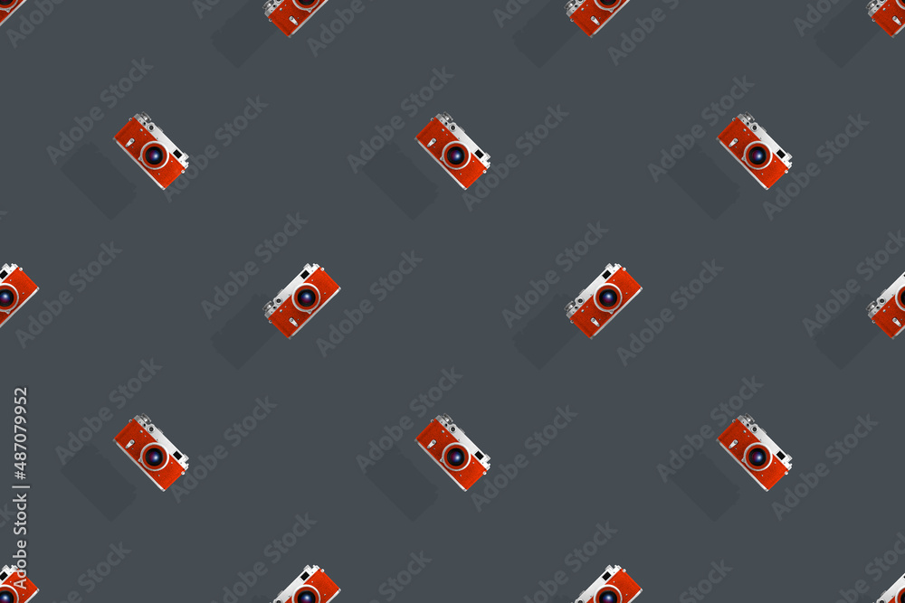 Seamless pattern from old cameras .Background on the theme of photography and photographic equipment. Seamless pattern from old cameras .Background on the theme of photography and photographic equipment.