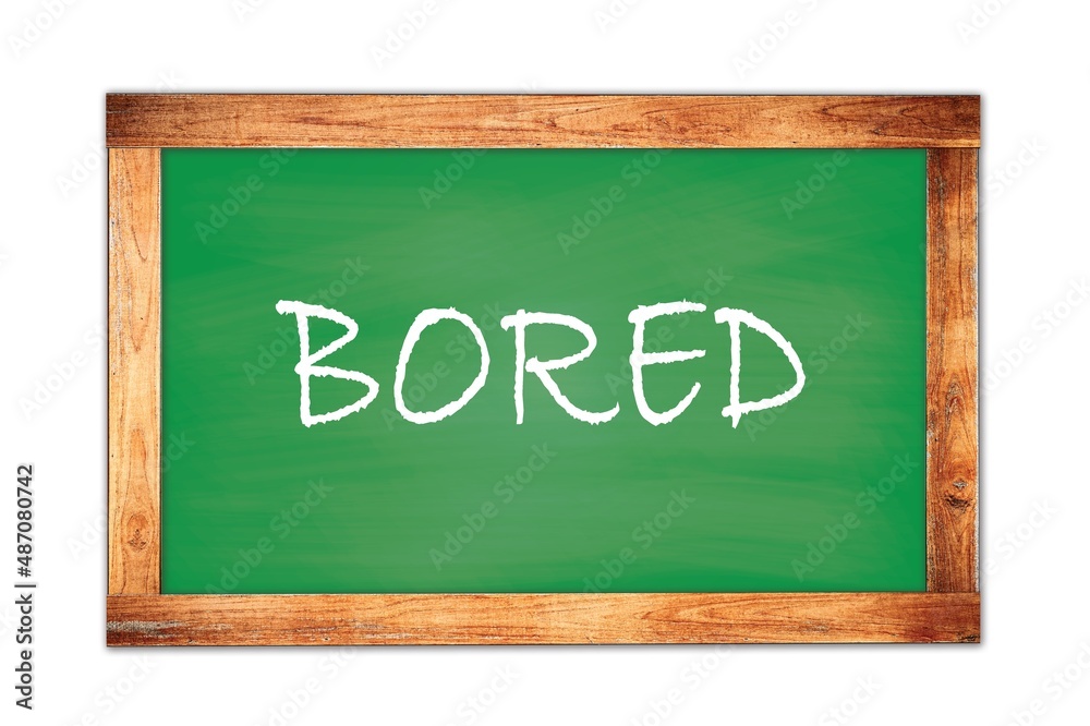 BORED text written on green school board. BORED text written on green school board.