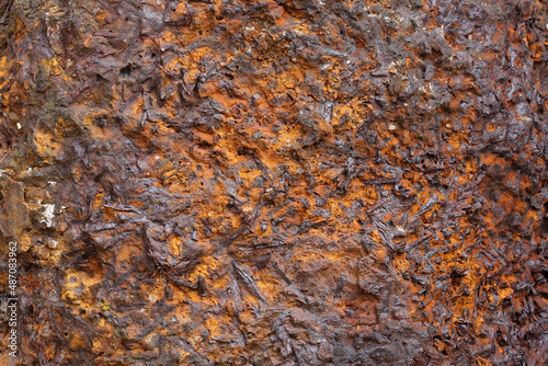 A close-up of rusting metal on a junkyard
