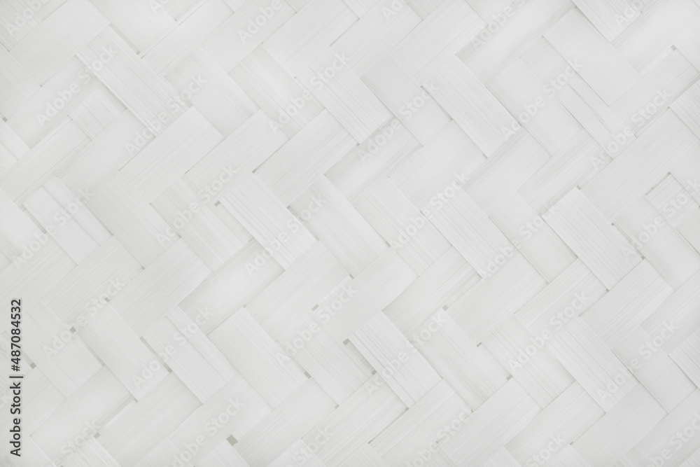 Old white bamboo weave texture background, pattern of woven rattan mat in vintage style. Old white bamboo weave texture background, pattern of woven rattan mat in vintage style.