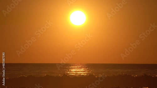 4K Golden Hour beach scenery. photo