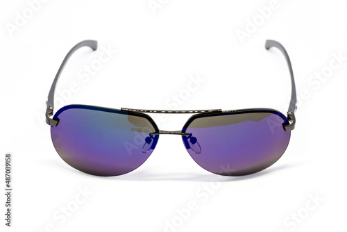 black sunglasses with purple mirror lens isolated on white background