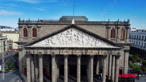 Opera House in the GDL-Mex. It has neoclassical and ancient architecture with the scene of apollo and his 9 muses. Ancient Greek architecture with pillars and pediment is clear in the building. photo