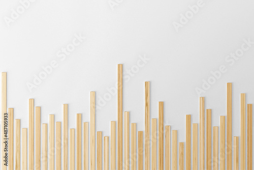 Business chart made of wood sticks on the wall