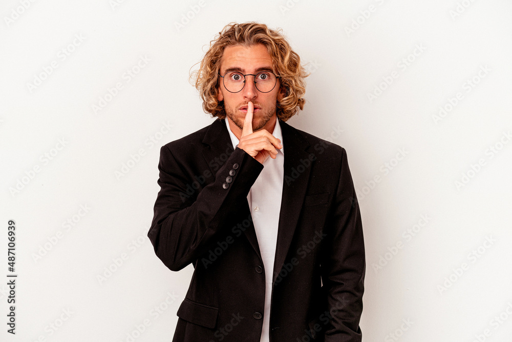 Young caucasian business man isolated on white background keeping a secret or asking for silence. Young caucasian business man isolated on white background keeping a secret or asking for silence.