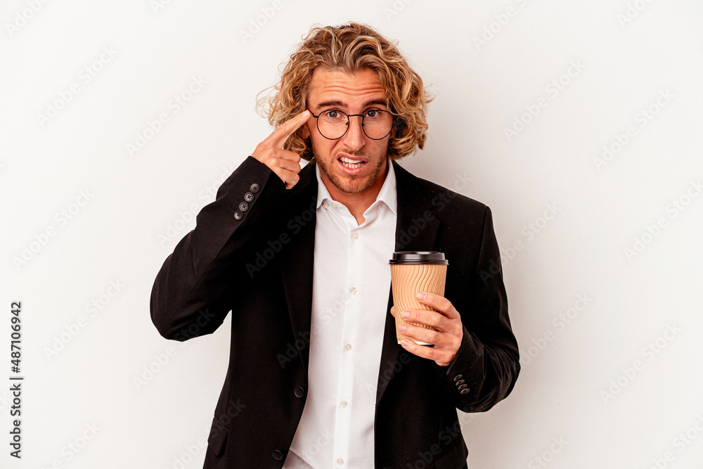 Young caucasian business man holding coffee isolated on white background showing a disappointment gesture with forefinger. Young caucasian business man holding coffee isolated on white background showing a disappointment gesture with forefinger.