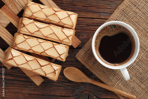 Glazed puff pastry and coffee photo