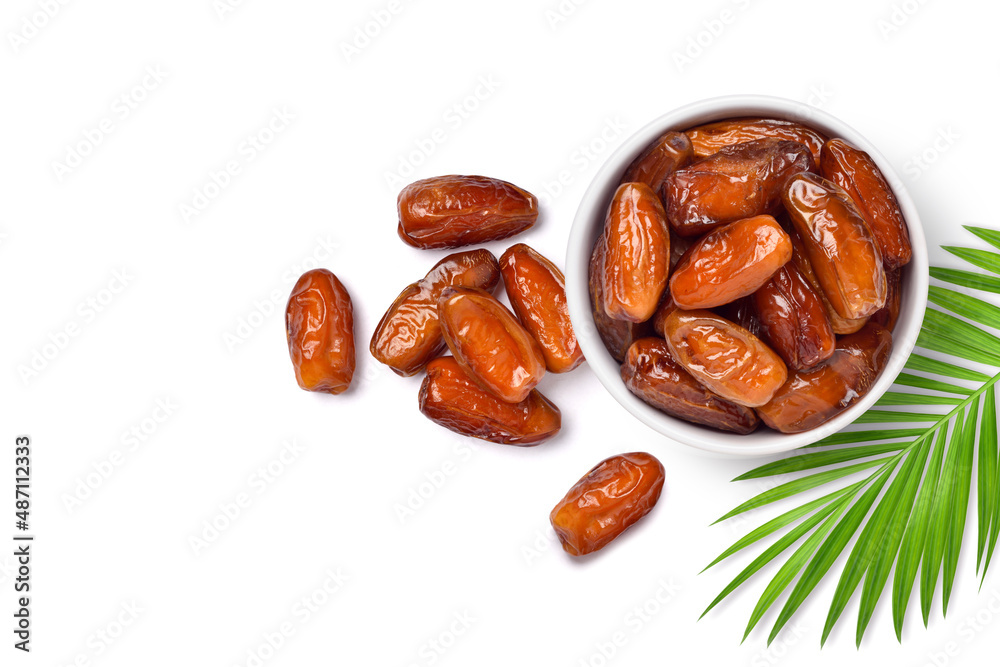 Obraz premium Top view of dried Date palm fruits isolate on white background.
