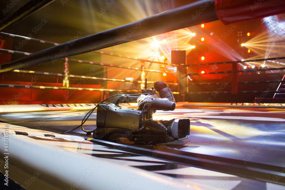 Studio camera on boxing stadium with spotlights. Stock Photo | Adobe Stock
