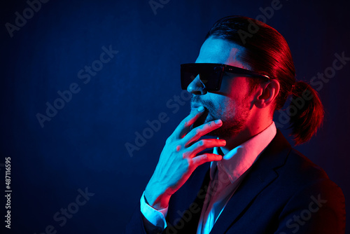 stylish man modern style suit fashion sunglasses neon light