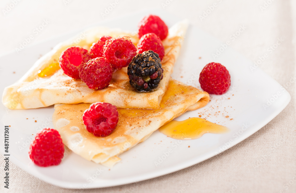 pancakes with raspberries, blackberries and honey pancakes with raspberries, blackberries and honey
