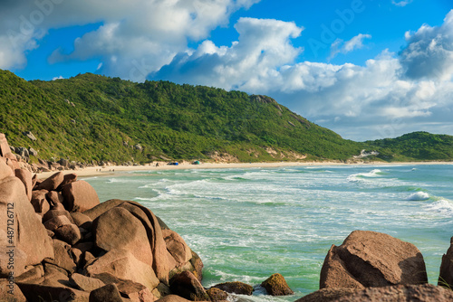 Praia da Galheta beach with amazing rocks and ocean waves. Tropical beach in Brazil