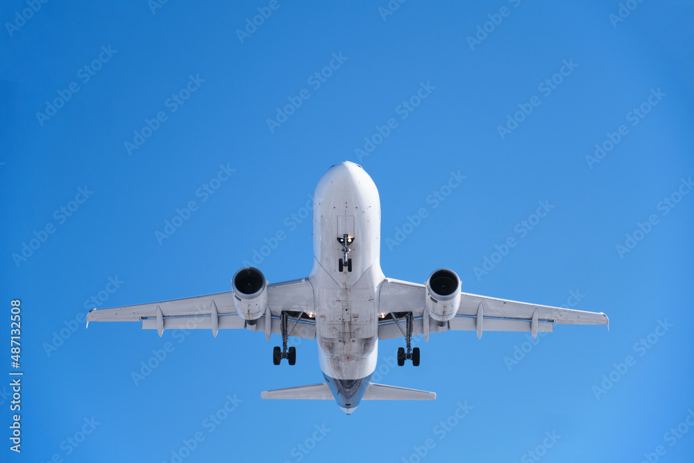 Close up of airplane in the blue sky