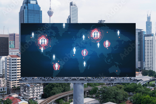 Photography World planet Earth map hologram on billboard over panorama city view of Kuala Lumpur, Malaysia, Asia