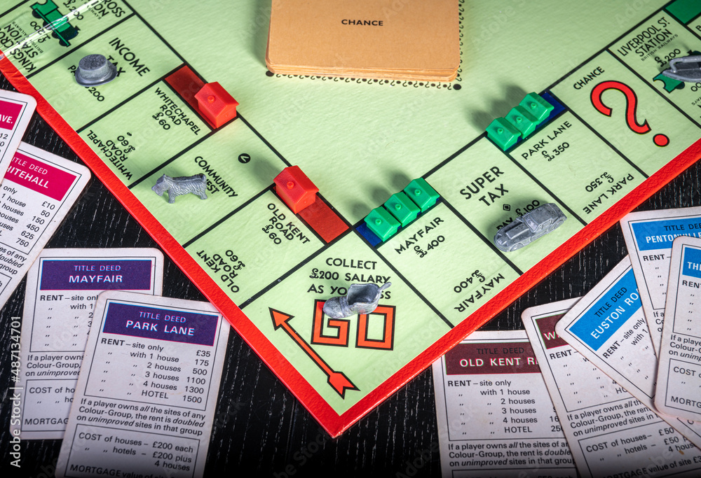 Passing Go on a Monopoly Board during a game Stock Photo | Adobe Stock