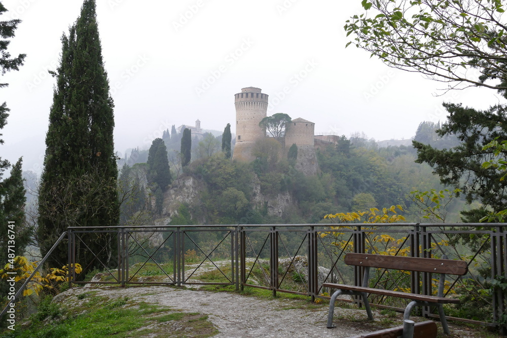 panorama of the fortress of Brisighella surrounded by the green countryside on a hill that dominates the village
