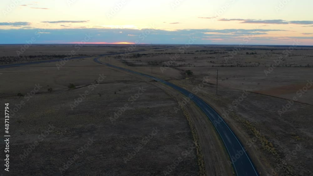 Roads Among Rural Fields At Sunset In Queensland, Australia - aerial drone shot