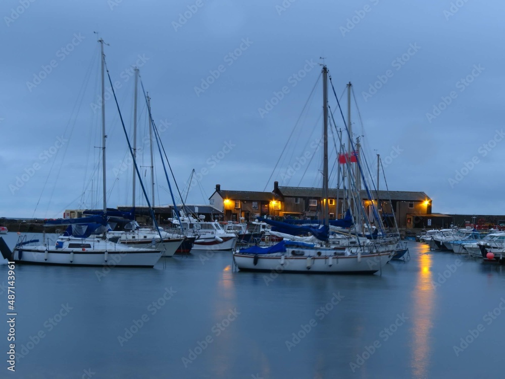 boats in the harbour at Lyme Regis at dawn