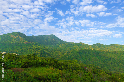 Green mountains and daytime sky,Panorama of beautiful countryside in summer