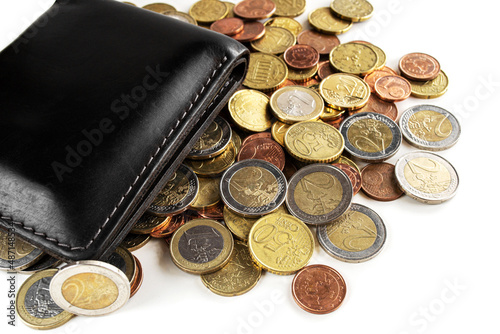 Black wallet with euros and cents on a white background