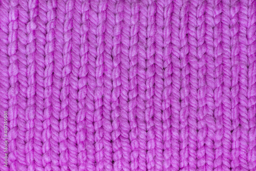 Purple wool fabric created on knitting needles, 