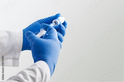 A doctor holds vaccine against new covid-19 variant. New generation vaccine against Coronavirus
