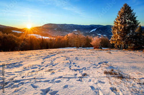 Sunrise panorama of mountains during winter time