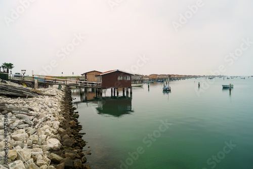 Casette dei pescatori e allevatori di vongole e cozze nei pressi di Chioggia Venezia Italia © Carlo