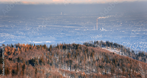 Industry and nature contrast panoramic view of urbanized scenery