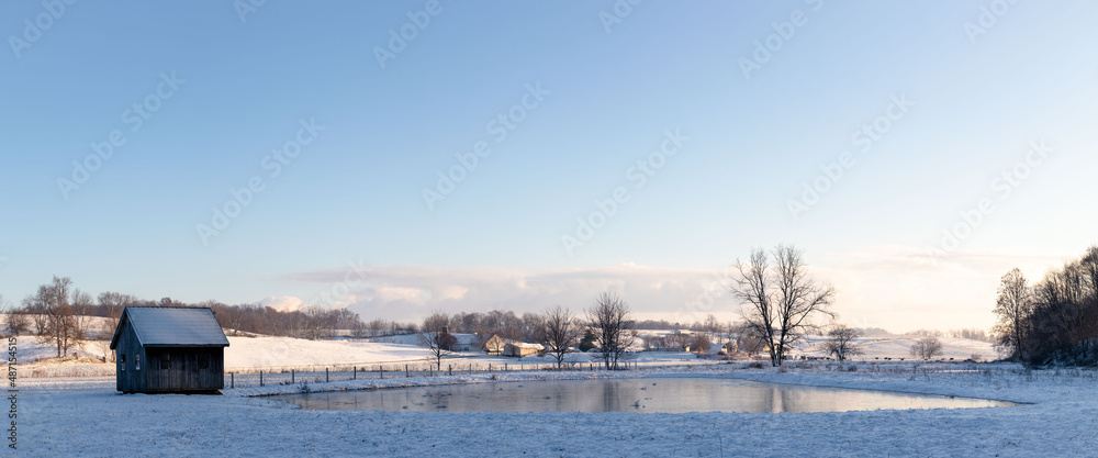 Frozen Pond Panoramic in a Rural Idyllic Amish Country Setting in the Golden Morning Sunrise