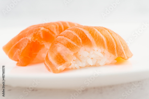 Salmon sushi shot in plate