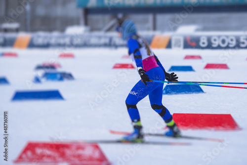 Alpine skiing race slalom competition, athletes ready to start ski competitions on a piste slope, nordic ski skier on the track in winter, giant slalom, winter sport and acitivities concept